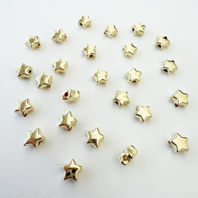 Perlen Sternform gold gelocht 6mm 25 Stück